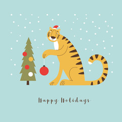Year of Tiger. New year's card. The Tiger in red santa hat with xmas ball and Christmas tree