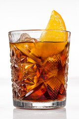 Americano or Negroni cocktail with orange slice in the rocks glass isolated on white background.