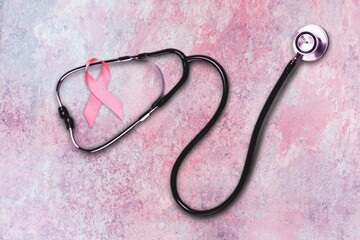 Pink ribbon and stethoscope on pastel background, Symbol of womens breast cancer