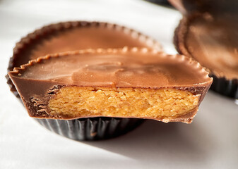 Close up macro shot of Peanut butter filled candy with chocolate frosting