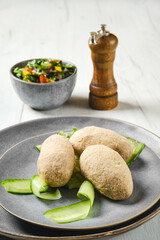 Semifinished frozen cepelinai. Potato dumplings stuffed with ground meat © boomeart