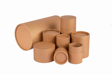 Different paper tubes with paper caps or lids, kraft recycle cardboard containers for packaging isolated on white with copy space, mockup. Recyclable and reusable packaging