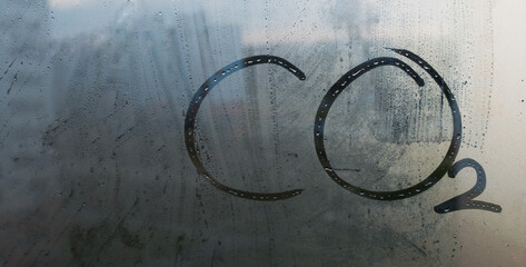 An imprint on the fogged glass