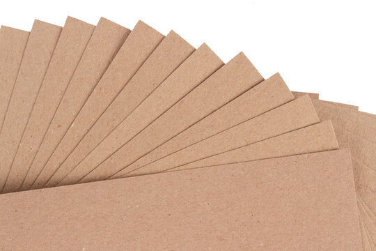Set of cardboard layer pads, sheets of recycled paperboard isolated on white. Environmentally friendly paper packaging. Packaging for safe transportation