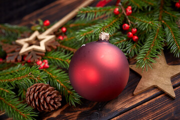 Christmas decoration with ball and fir branches