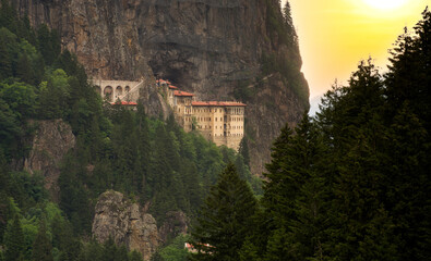 Panorama of Historic Sumela Monastery at sunset.
It is a Greek Orthodox monastery and church complex. Macka, Trabzon, Turkey