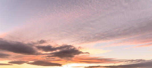 Naklejka na ściany i meble Glowing sky at dusk on a fall evening. Banner, panoramic.