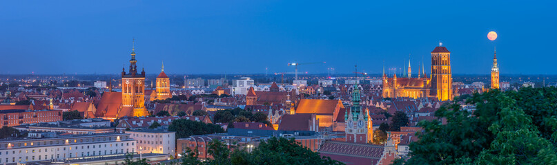 Naklejka na ściany i meble Gdansk, Poland, night view of the historical city center with St Mary's church