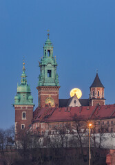 Full moon over Wawel castle in Krakow, Poland