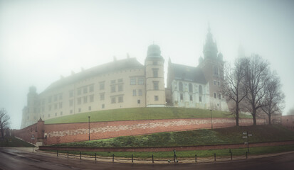 Wawel castle and cathedral in the morning fog, Krakow, Poland