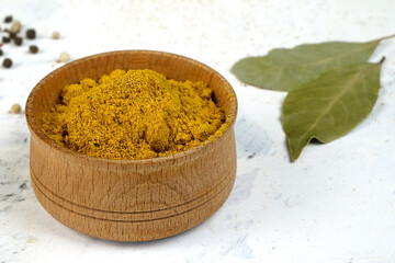 Spices ground curry or turmeric in wooden spice jar, for preparation savory tasty food.. - 469379329