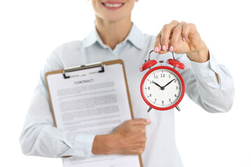 Businesswoman holds a contract and alarm clock for ten in morning