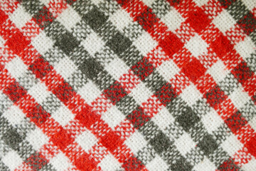 Christmas plaid woolen fabric texture background.