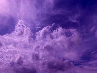 Fantastic purple clouds in the heaven. Night fantasy cloudy sky. Incredible evening cloudscape....