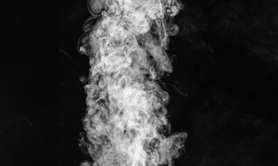 White smoke on a dark black background