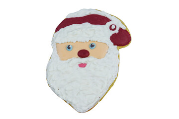 Christmas gingerbread cookie made in shape of Santa Claus isolated on white background