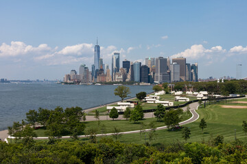 Lower Manhattan Skyline view and Luxury Camping Tents on Governors Island in New York City during...