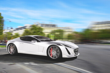 Sporty white car runs fast on the road