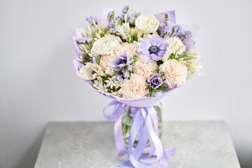Beautiful bouquet of mixed flowers with ranunculus clooney hanoi. Floral shop concept . Beautiful fresh cut bouquet. Flowers delivery