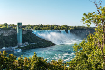 Fototapeta na wymiar Famous Niagara Falls on a sunny day from Canadian side