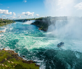 Famous Niagara Falls on a sunny day from Canadian side