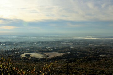 scenic view from mountain top overlooking valley below