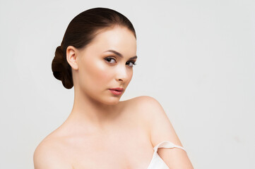 Beautiful woman with clear skin. SPA concept. Natural beauty. Stylish model