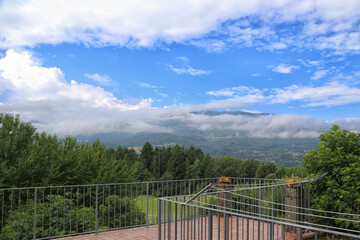 Scenic view of Mountains, trees and green landscape by a balcony in Tuscany