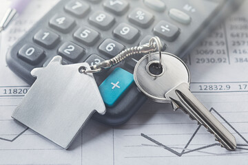 Real estate, keychain with house symbol. Key with finance blank.