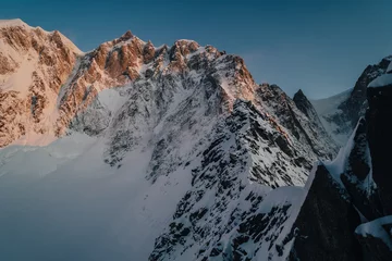 Fotobehang Gletsjer Alpine mountain landscape of Mont Blanc Masiff, Chamonix, France. Alpine peaks, Aiguille du Midi and other famous alpine mountains. Alpinism, climbing, glaciers and snow.  © Ondra