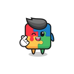 puzzle character doing Korean finger heart