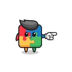 puzzle mascot with pointing right gesture