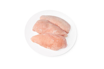 Three pieces of raw frozen fillet on a white plate on a white plate copy space.Frozen chicken fillet.