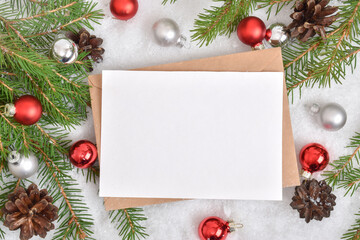 Fototapeta na wymiar Christmas invitation. Layout with an envelope and an empty space. Happy New Year.