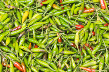 Photos of piles of cayenne peppers sold in traditional markets are suitable for photos of products for sale and backgrounds