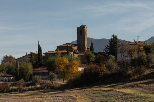 Autumnal skyline of the small town of Bailo, with its tower of the church de San Fructuoso, in the region of La Jacetania, province of Huesca, Aragon, Spain