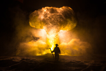 Fototapeta premium Nuclear war concept. Explosion of nuclear bomb. Creative artwork decoration in dark.