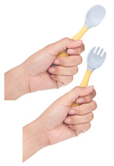 Collection of hand holding Bendable kids training Spoon Fork Set isolated on white background.