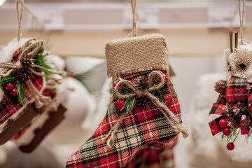 Christmas toy on the Christmas tree. New Year decoration. Decorated shop window