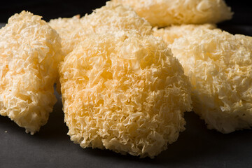 dry tremella on black background