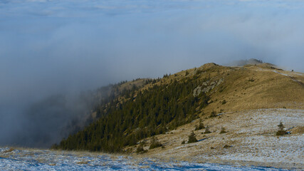 Mountain crest in a sea of clouds
