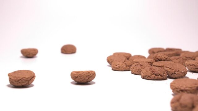Big amount of pepernoten for Sinterklaas celebration. Slow motion.