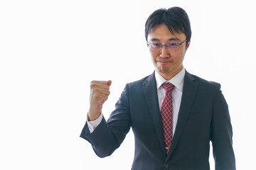 ガッツポーズをするビジネスマン