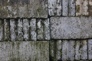 The neatly arranged bricks that will be used as the foundation of a house that looks good are used as a background