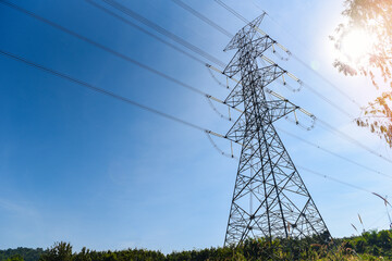 High voltage post, High voltage tower sky background on the mountain forest, Electricity poles and...