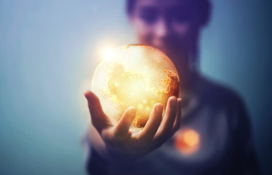 Young woman holding globe earth vr technology, metaverse concept.