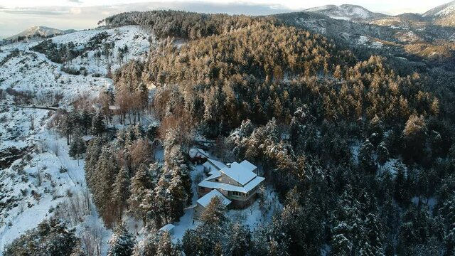 Aerial view of the snowy mountain Taygetus (also known as Taugetus or Taygetos) above Messenia unit in Peloponnese, Greece. Amazing natural scenery of the highest mountain in Peloponnese during winter