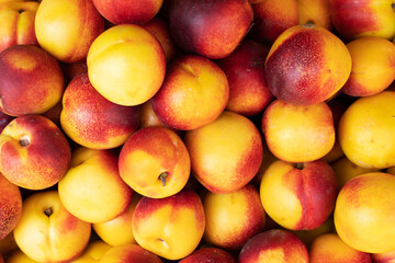 background of juicy ripe fruits nectarines