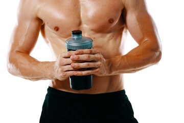 Naklejka premium athletic man with a pumped-up torso drink bottle sportspit
