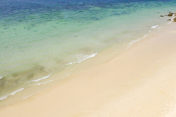 aerial view of the sea and ocean waves. The wind blows on the beaches in the evening of the islands of the Andaman Sea.